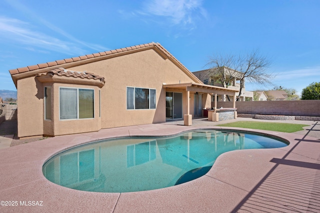 view of swimming pool with a fenced in pool, a patio area, and a fenced backyard