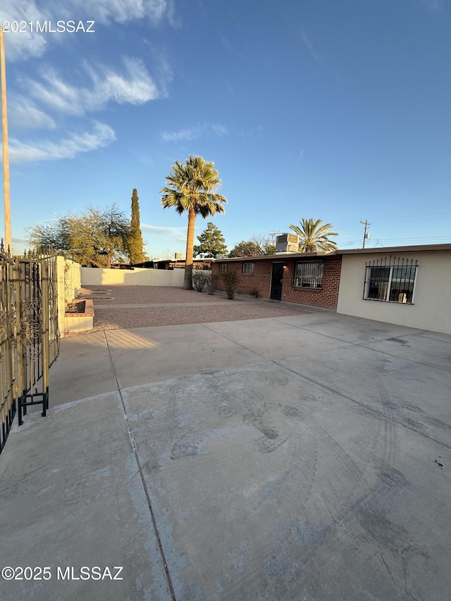 exterior space featuring a patio and fence