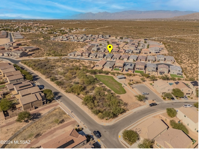 drone / aerial view featuring a mountain view and a residential view