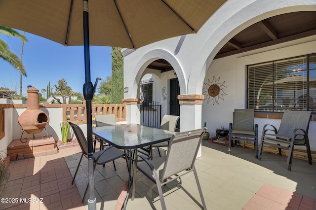 view of patio with outdoor dining area