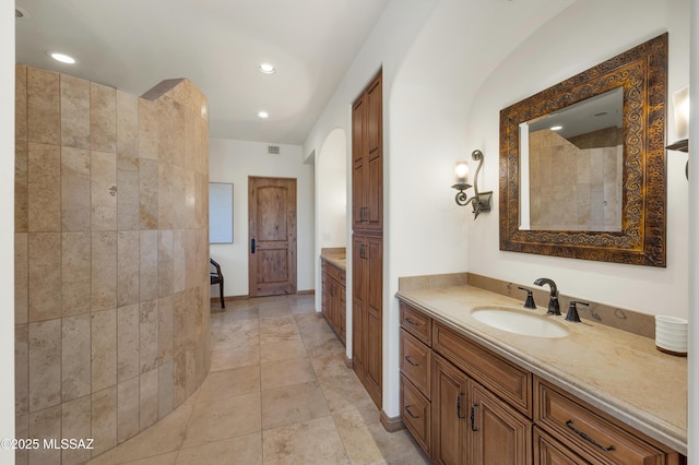 full bath with vanity, tile patterned floors, visible vents, and recessed lighting