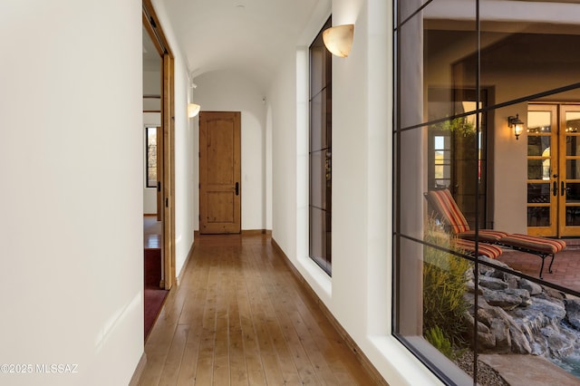 hall with wood finished floors