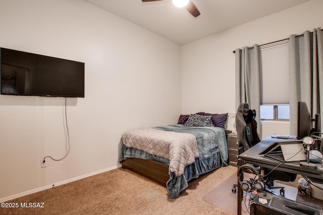 bedroom featuring carpet, baseboards, and ceiling fan