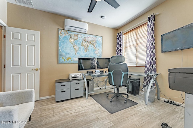 home office featuring wood tiled floor, visible vents, baseboards, and a wall mounted AC