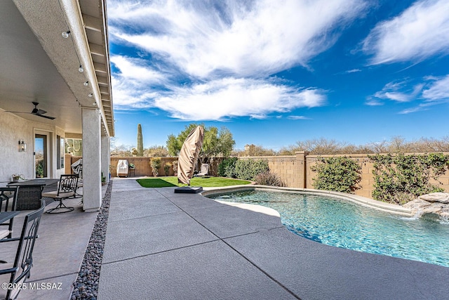 view of pool with a fenced in pool, a patio area, and a fenced backyard