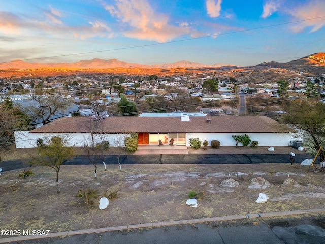 view of front of home with a mountain view