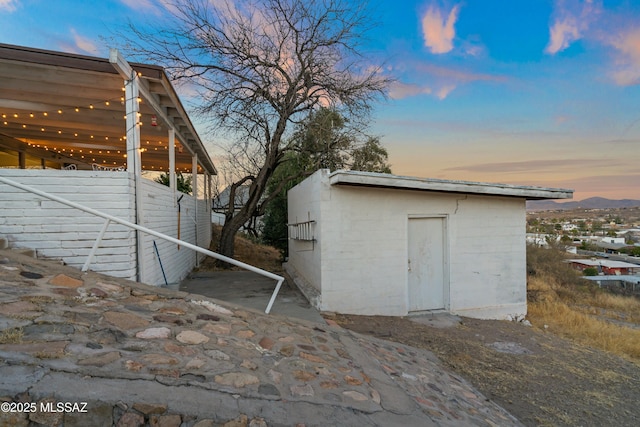 view of shed featuring a mountain view