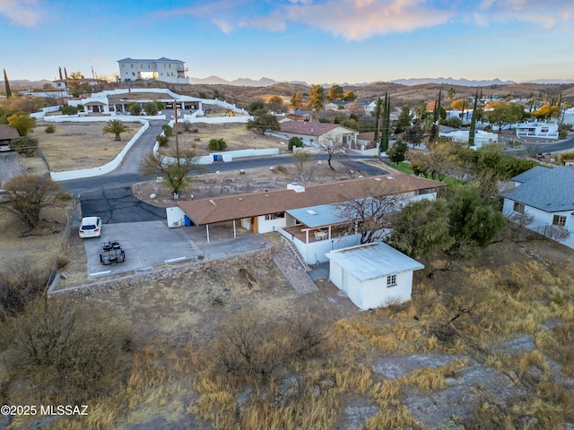 aerial view featuring a residential view and a mountain view