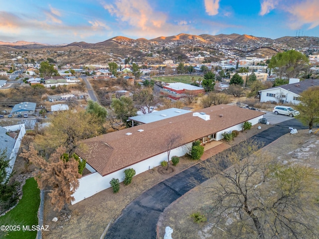 birds eye view of property with a residential view and a mountain view