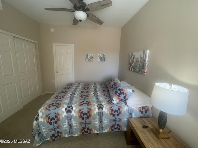 carpeted bedroom featuring a closet and ceiling fan