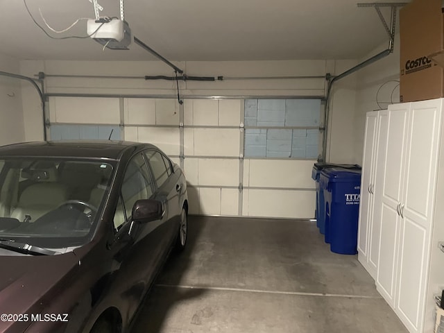 garage featuring a garage door opener