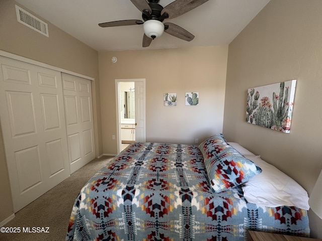 bedroom with carpet, visible vents, ceiling fan, and a closet