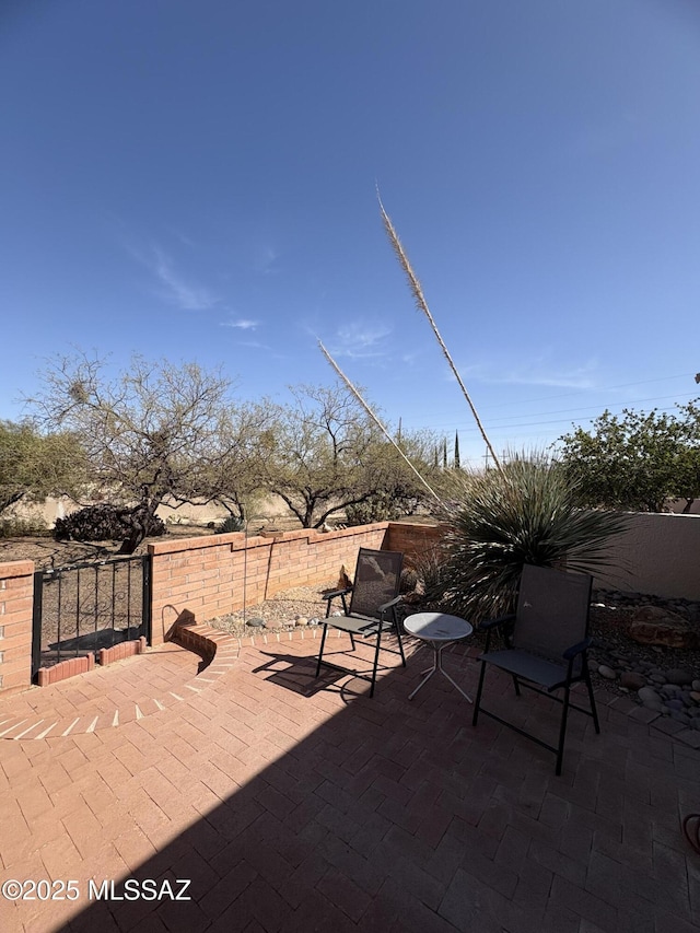 view of patio / terrace with fence