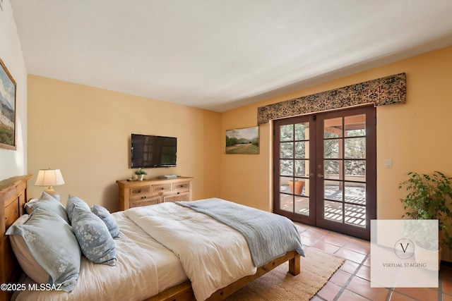 bedroom with access to exterior, french doors, and light tile patterned floors