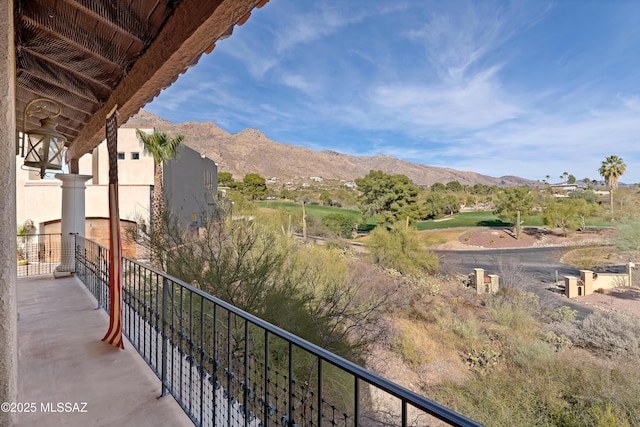 balcony featuring a mountain view