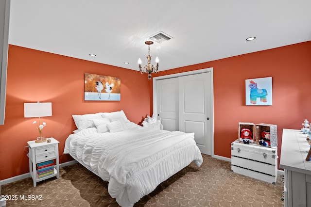 bedroom featuring recessed lighting, a notable chandelier, visible vents, baseboards, and a closet