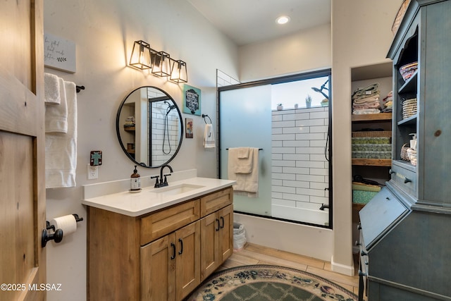 16 Star View Dr, Sonoita, AZ 85637 - bathroom with vanity, shower / bath combination with glass door, wood finished floors, and recessed lighting
