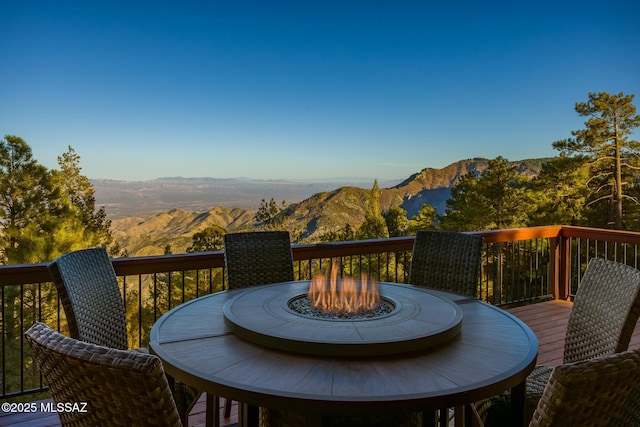 wooden terrace with a mountain view