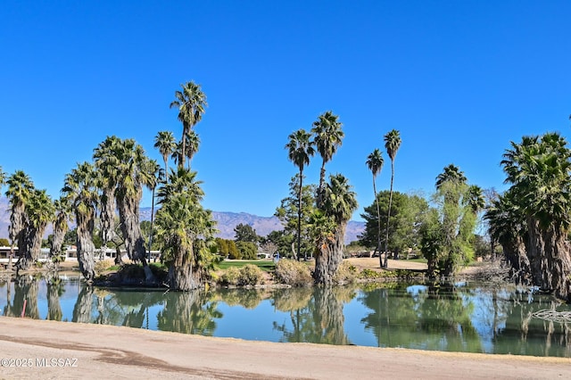 property view of water featuring a mountain view