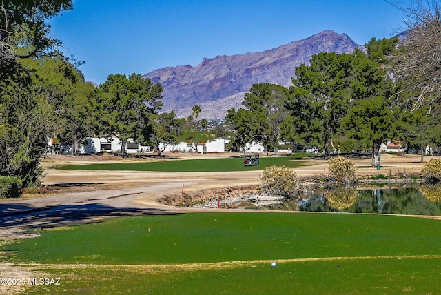 view of community featuring a water and mountain view