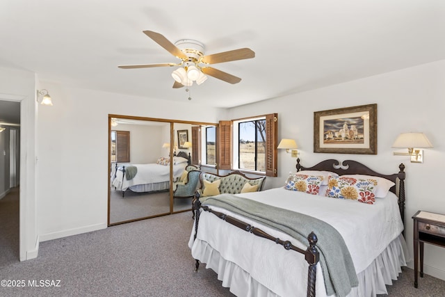 carpeted bedroom with ceiling fan, baseboards, and a closet