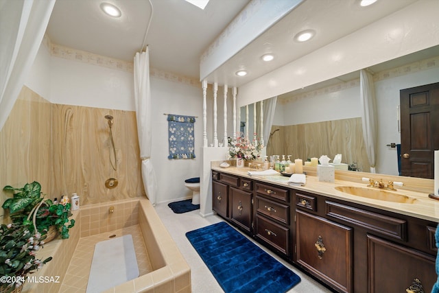 full bathroom with toilet, recessed lighting, a sink, tile patterned floors, and double vanity