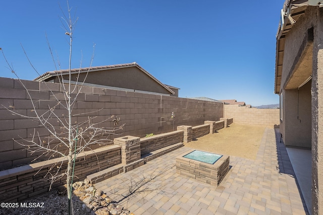 view of patio / terrace with a fenced backyard