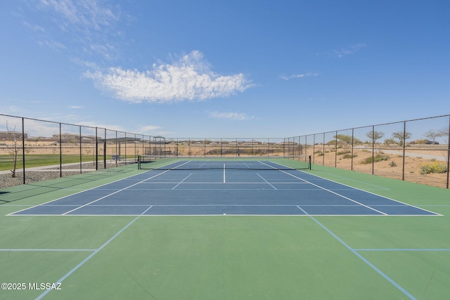 view of sport court with fence