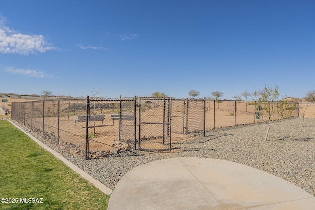 view of yard featuring a gate and fence