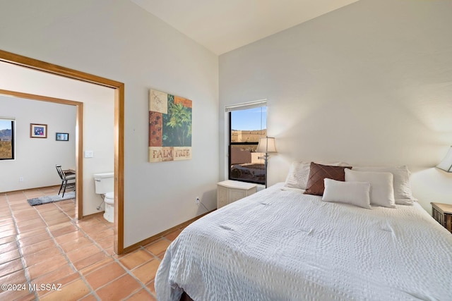 bedroom featuring light tile patterned flooring