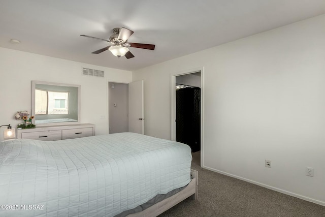 bedroom featuring dark colored carpet, a ceiling fan, visible vents, and baseboards