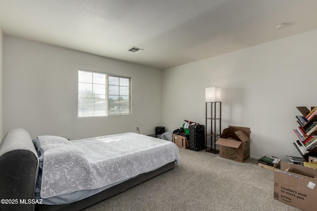 carpeted bedroom with visible vents