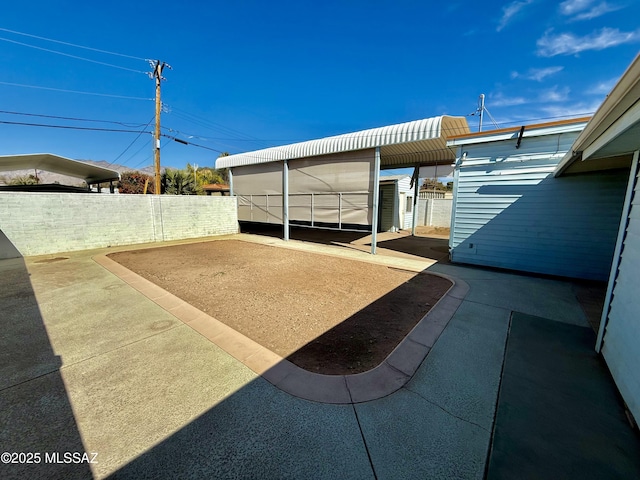 exterior space featuring a fenced backyard