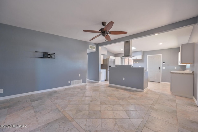 4301 E Hayhurst St, Tucson, AZ 85712 - unfurnished living room with a ceiling fan and baseboards