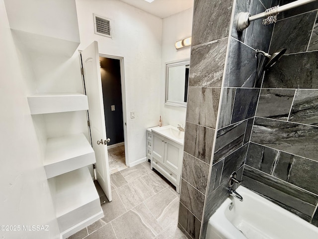 full bathroom featuring baseboards, visible vents, bathing tub / shower combination, and vanity