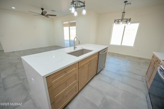 kitchen featuring visible vents, dishwasher, hanging light fixtures, a sink, and recessed lighting