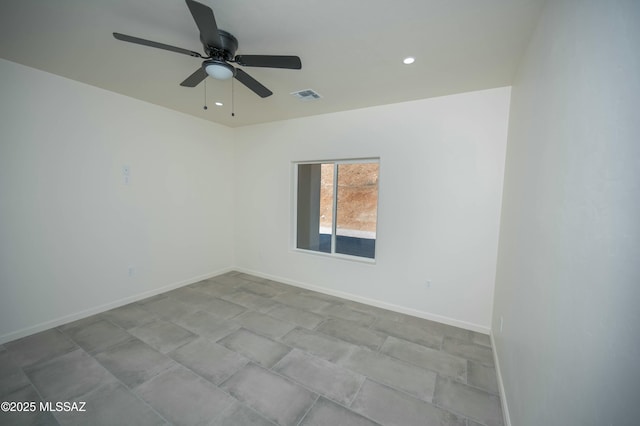 unfurnished room with a ceiling fan, recessed lighting, visible vents, and baseboards