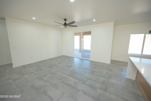 empty room with recessed lighting, visible vents, ceiling fan, and baseboards