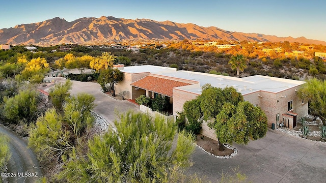 exterior space featuring a mountain view