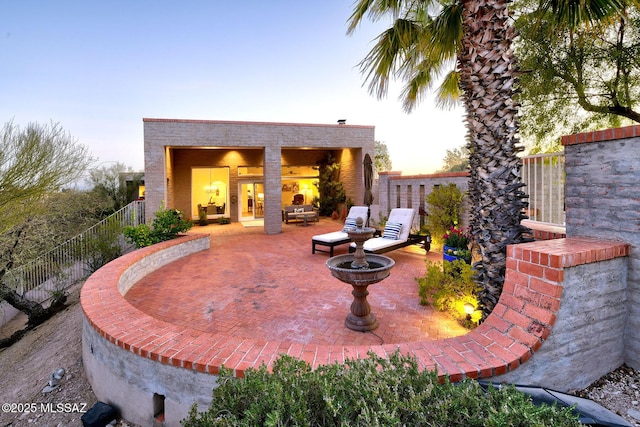 view of patio featuring fence