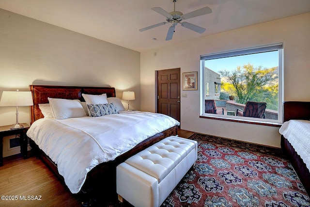 bedroom featuring ceiling fan and wood finished floors