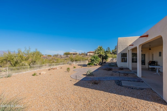 view of yard featuring a fenced backyard and a patio