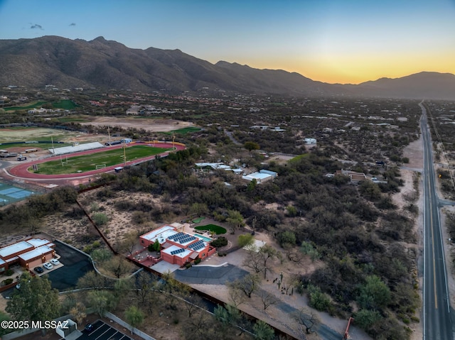 birds eye view of property featuring a mountain view