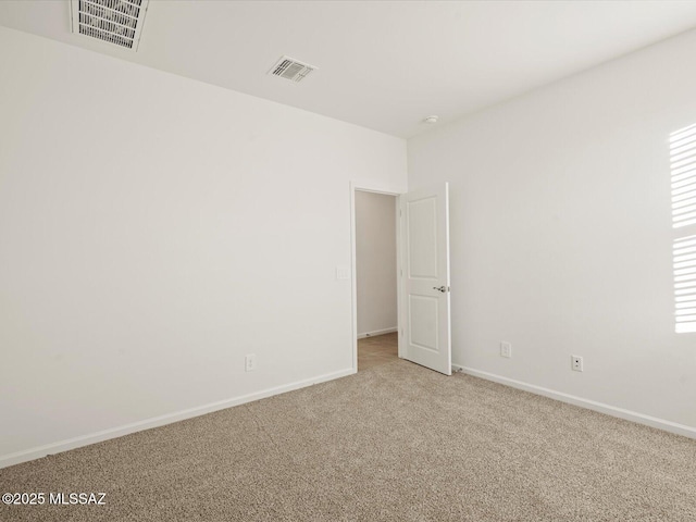 314 N Pecan Pie Pl, Sahuarita, AZ 85629 - carpeted spare room featuring baseboards and visible vents