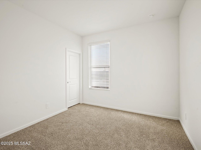 314 N Pecan Pie Pl, Sahuarita, AZ 85629 - unfurnished room with light colored carpet and baseboards