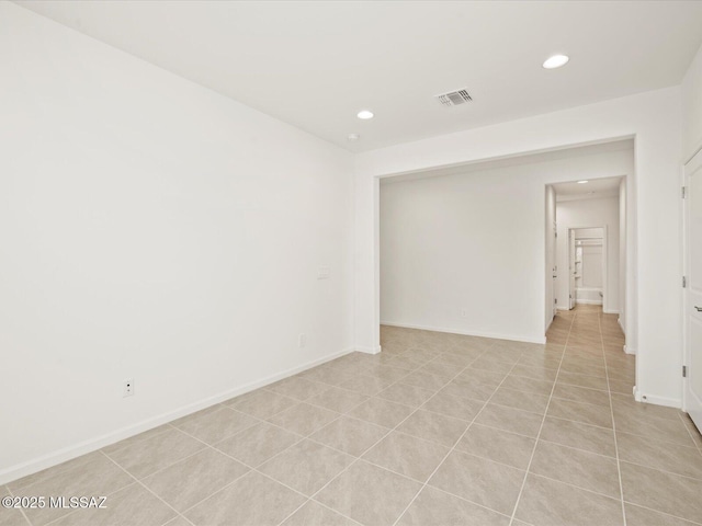 314 N Pecan Pie Pl, Sahuarita, AZ 85629 - unfurnished room with baseboards, visible vents, and recessed lighting