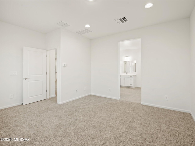 314 N Pecan Pie Pl, Sahuarita, AZ 85629 - unfurnished room with visible vents, baseboards, and light carpet