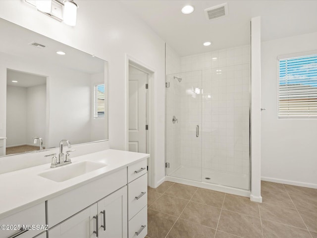 314 N Pecan Pie Pl, Sahuarita, AZ 85629 - full bathroom with visible vents, a shower stall, recessed lighting, and tile patterned flooring