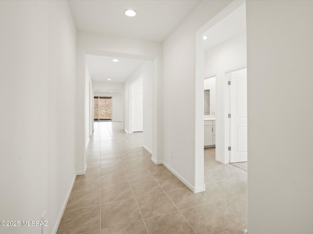 314 N Pecan Pie Pl, Sahuarita, AZ 85629 - hallway featuring light tile patterned floors, recessed lighting, and baseboards