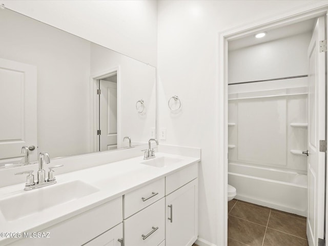 314 N Pecan Pie Pl, Sahuarita, AZ 85629 - bathroom with toilet, tile patterned flooring, double vanity, and a sink